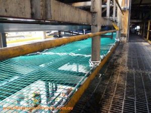 Working below conveyor safety net